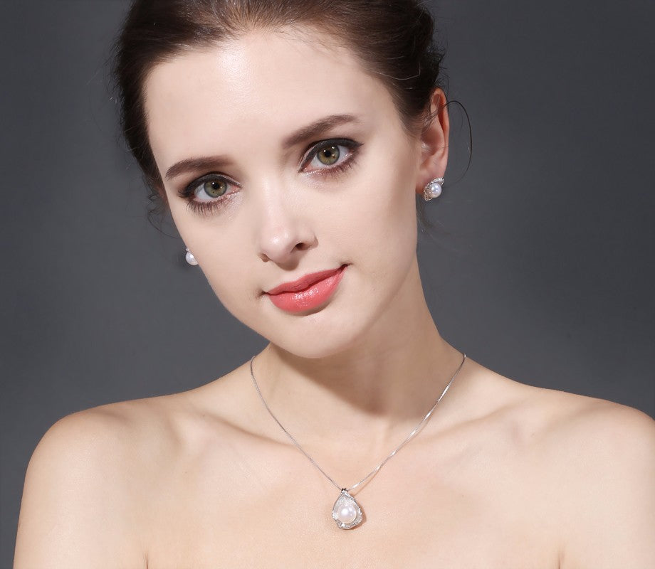 ensemble collier et boucles d'oreilles en argent et vraies perles